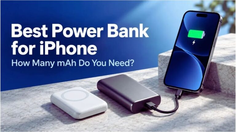 iPhone charging with a portable power bank beside a compact magnetic power bank.